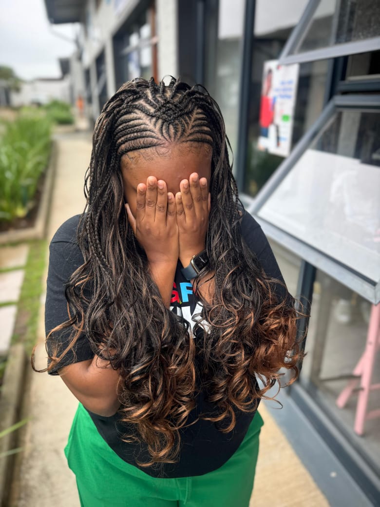 Cornrows hairstyle at Touch of Beauty salon